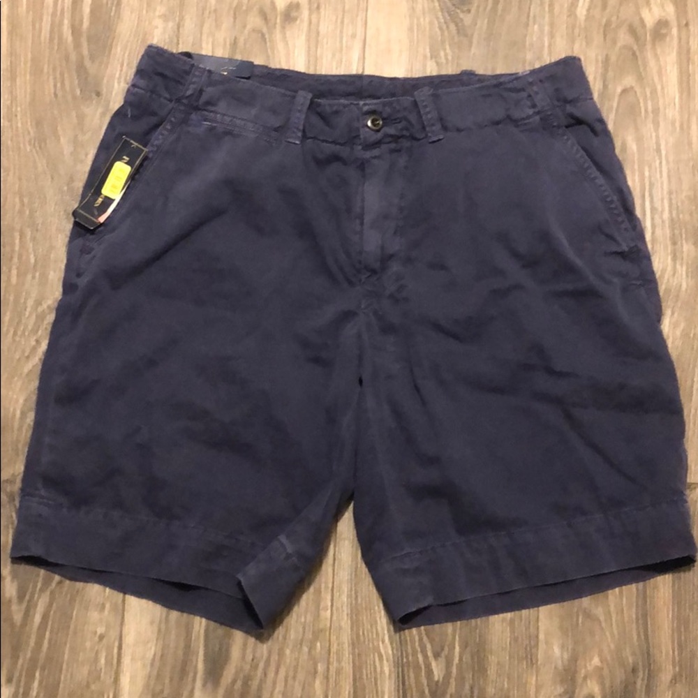 Navy polo by Ralph Lauren shorts